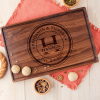 Personalized walnut cutting board as personalized wooden wedding gifts.