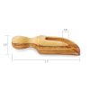 A wooden salt spoon with measurements on it.