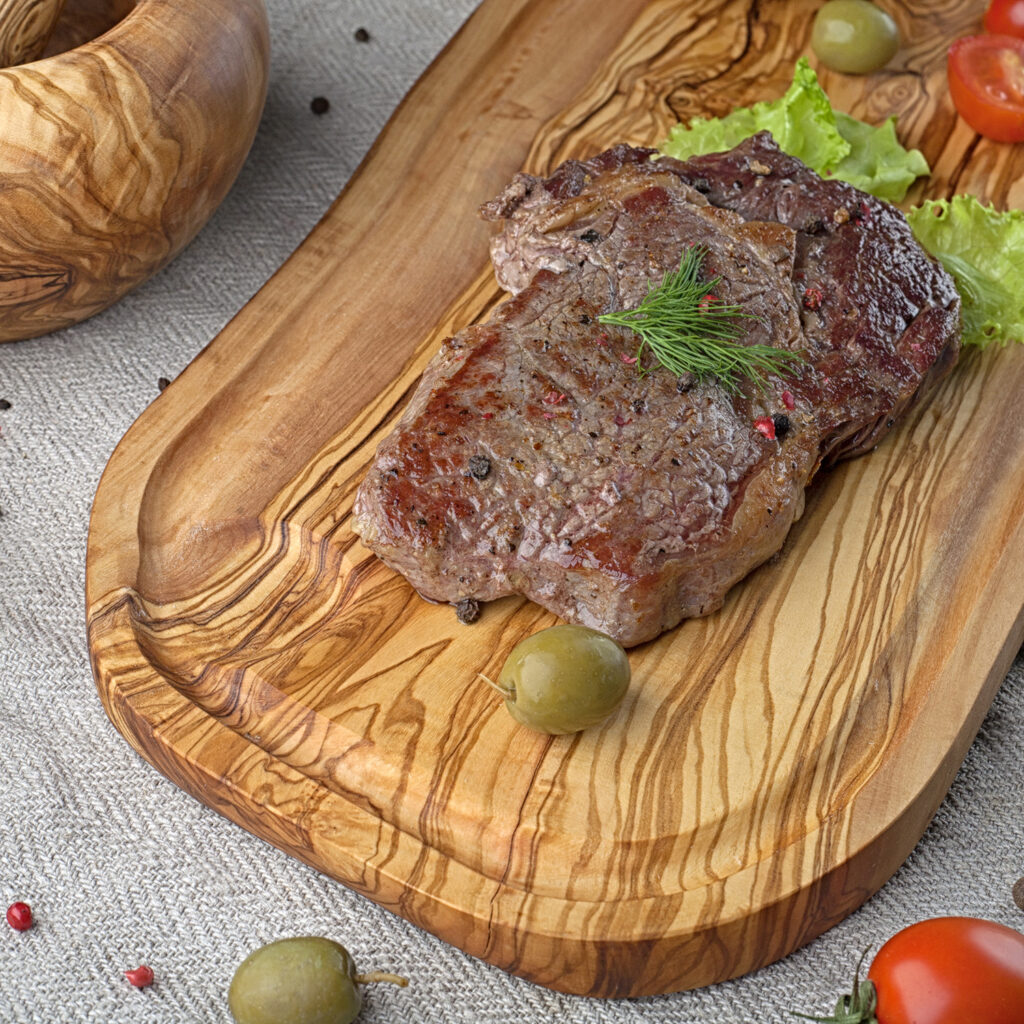olivewood cutting board with juice groove