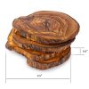 A set of four wooden coasters with measurements.