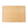 Bamboo cutting board on a white background.