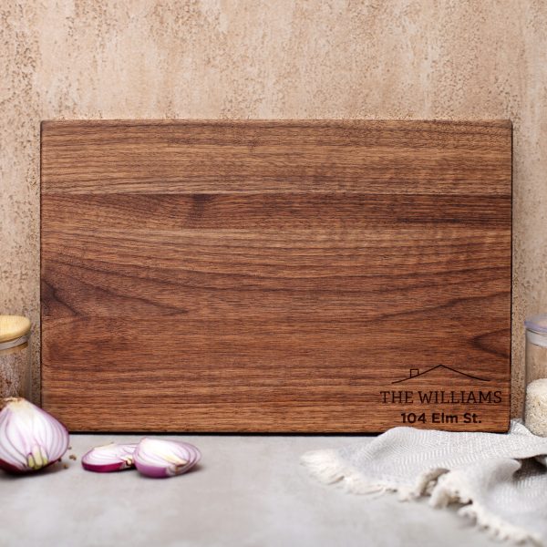Personalized walnut cutting board.
