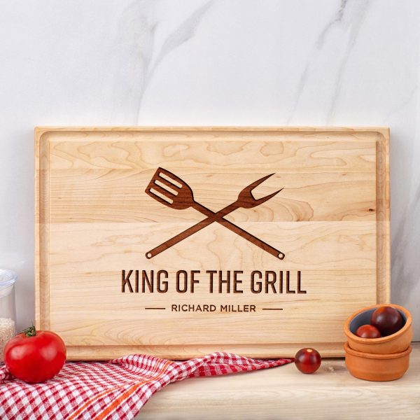 King of the grill personalized cutting board.