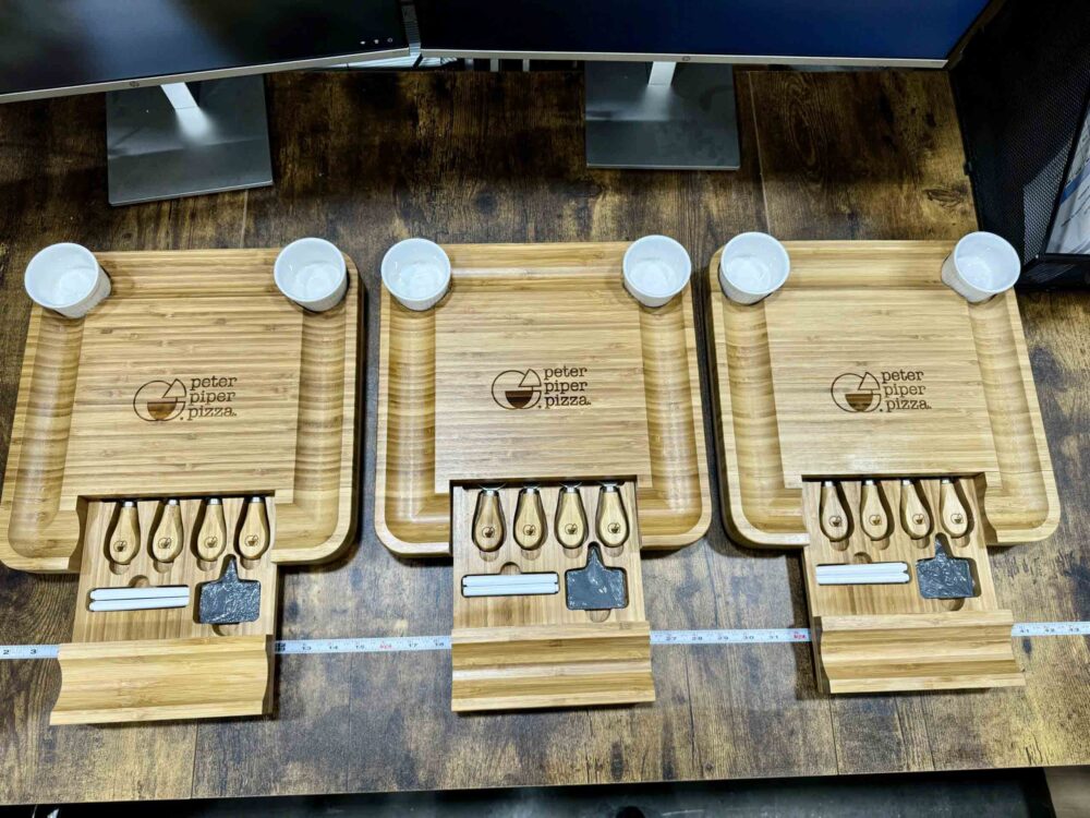 Olive wood cutting boards with cheese knives