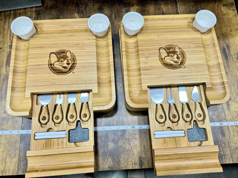 Olive wood cutting boards with cheese knives