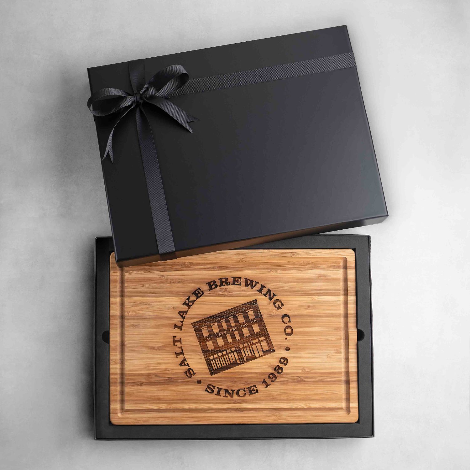 Personalized cutting board with logo