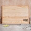 A rectangular custom cutting board with the words custom logo.