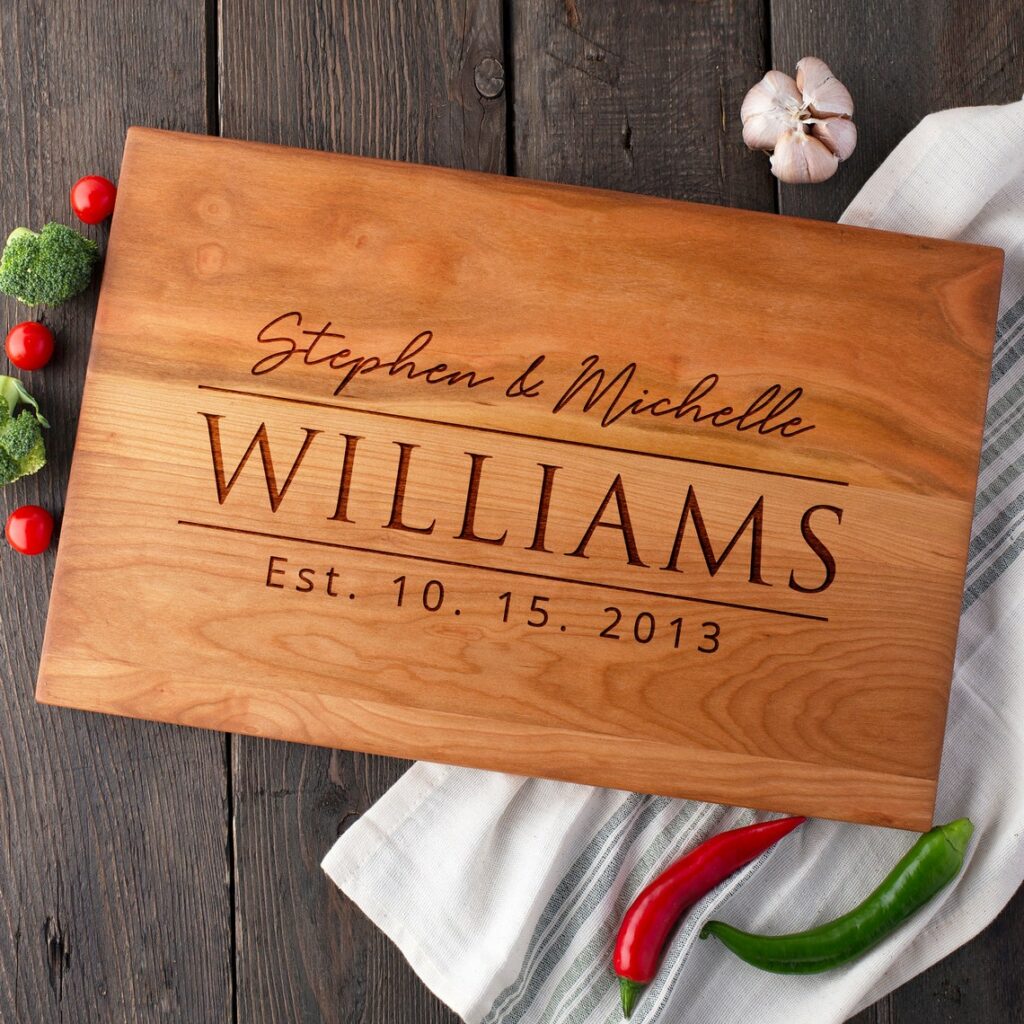 live edge cutting board with the name Williams on it.