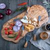 Personalized Charcuterie Board Set with Cheese Knives, cheese, vegetables, and utensils.