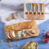 A cheese board with cheese and fruit on it.