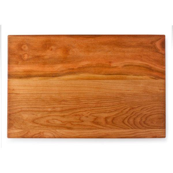 A wood cheese board on a white background.