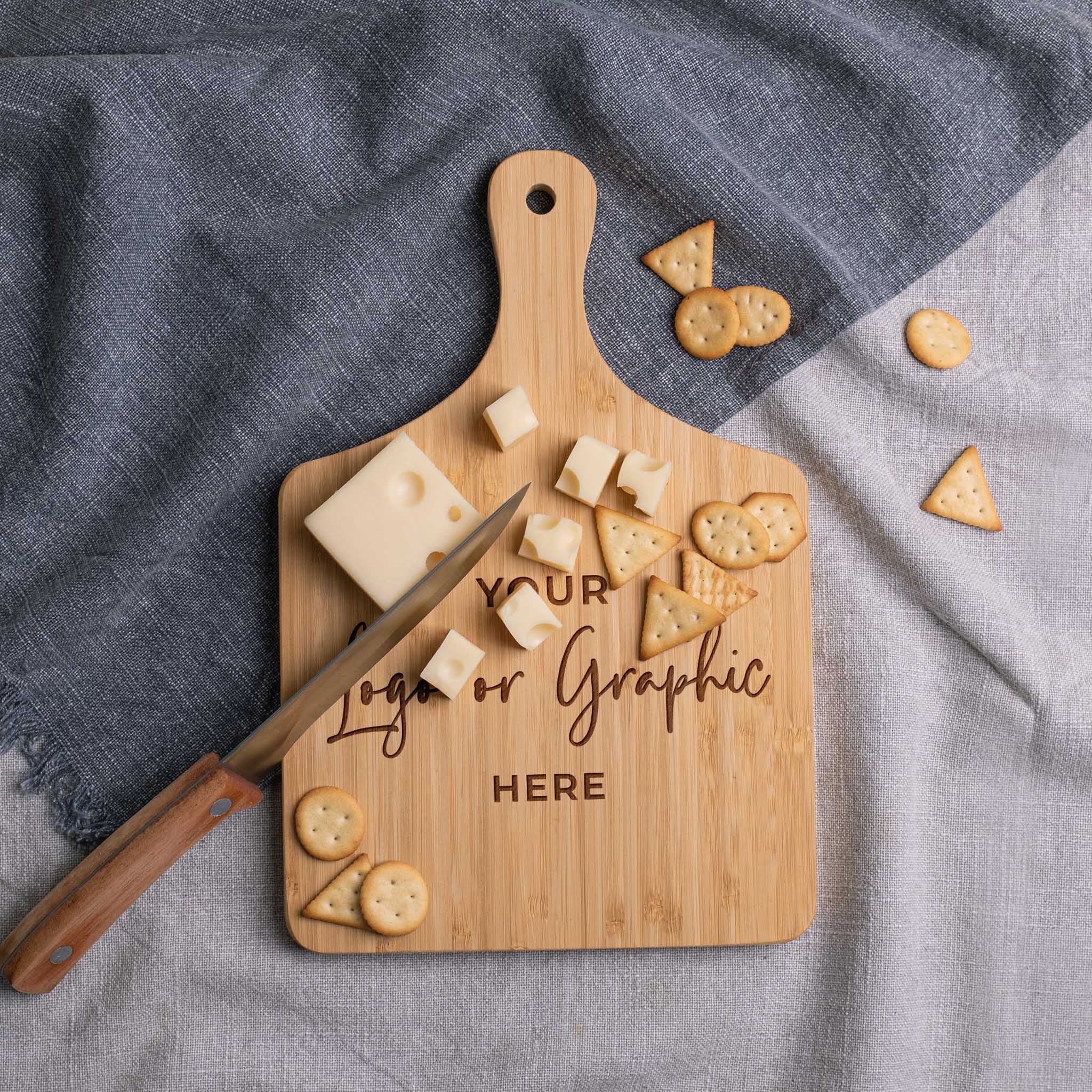 Wooden cutting board with customizable logo