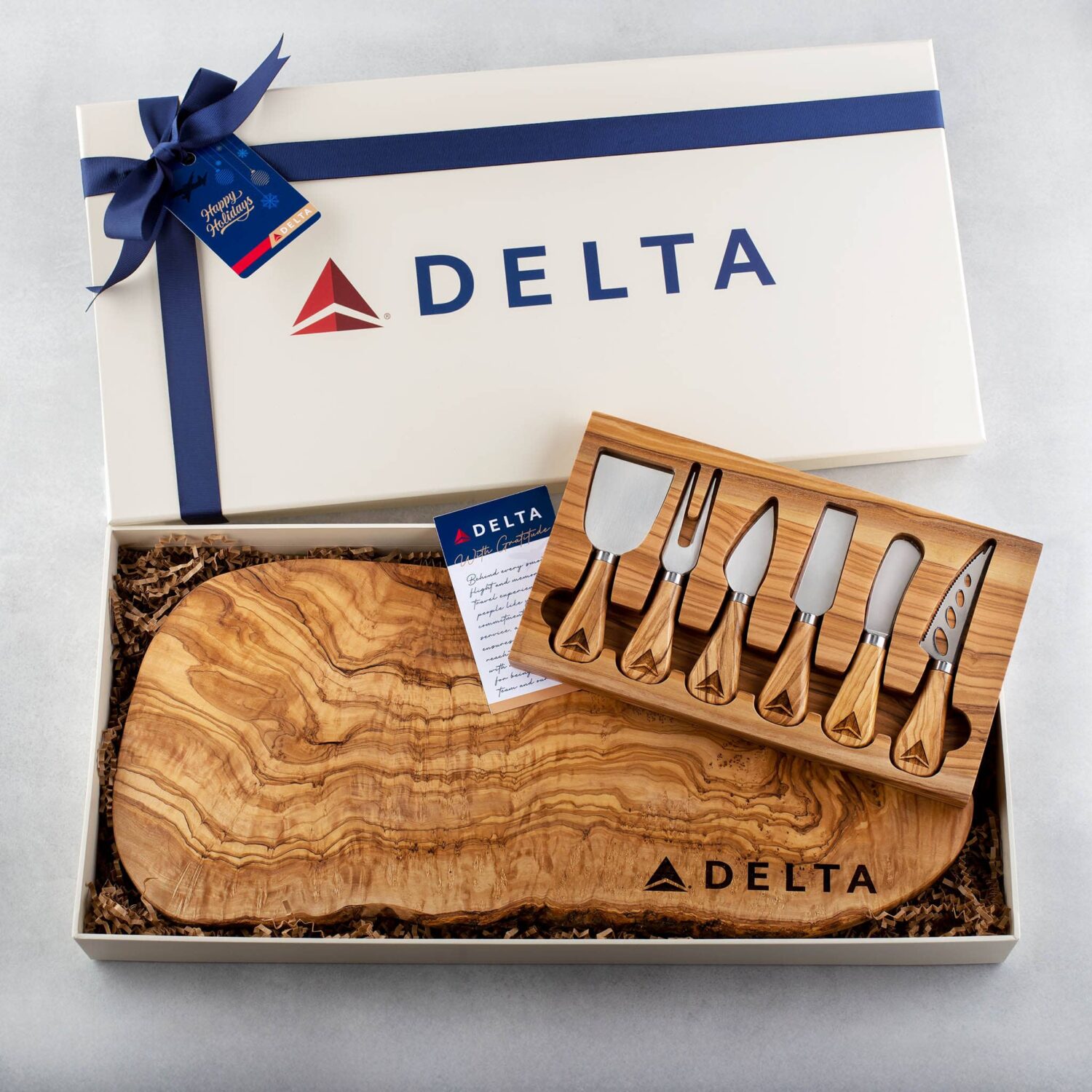 corporate gift box with cheese knives and cutting board