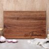 Personalized walnut cutting board.