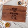 A custom walnut cutting board with logo.