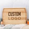 A custom maple cutting board with engraved logo.